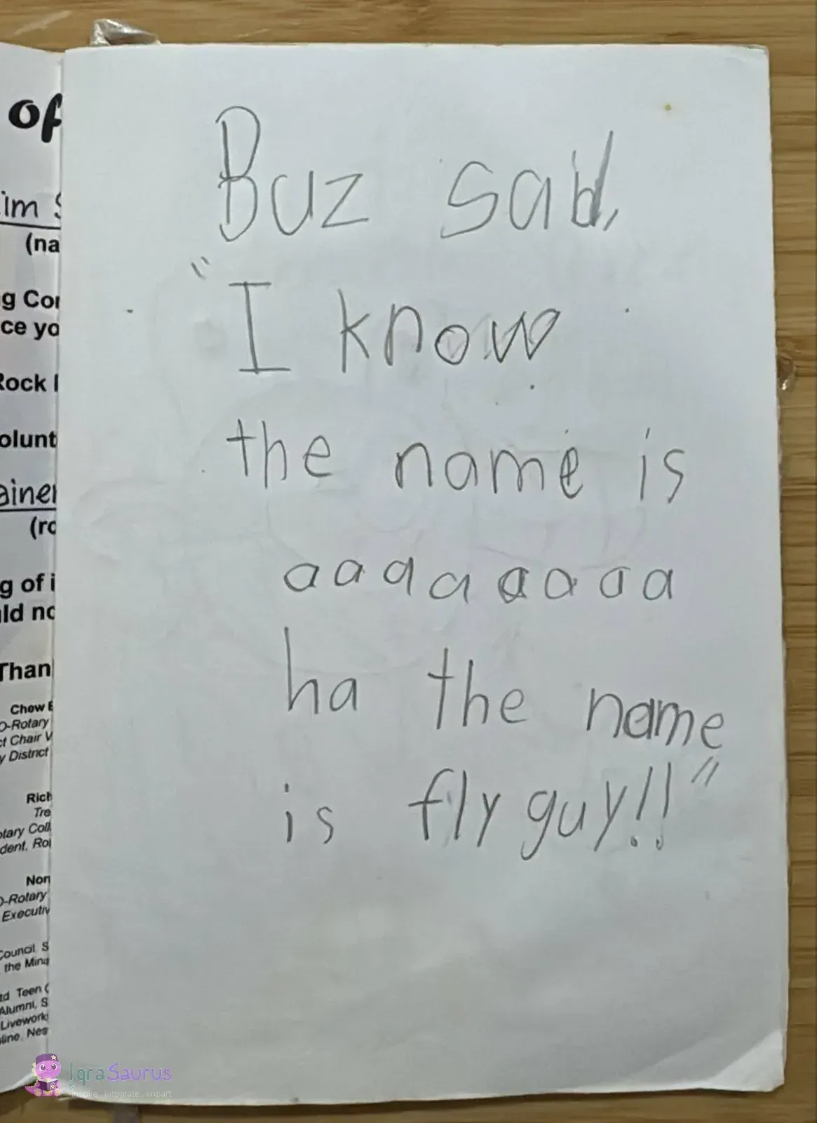 A page of large pencil handwriting on the blank back of a reused printed programme sheet.
