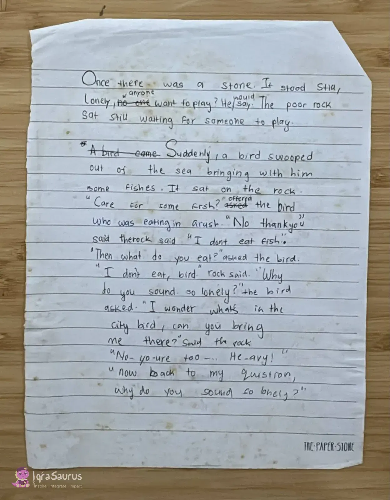 A handwritten page of the story on lined notepaper, with a few words crossed out and corrected.